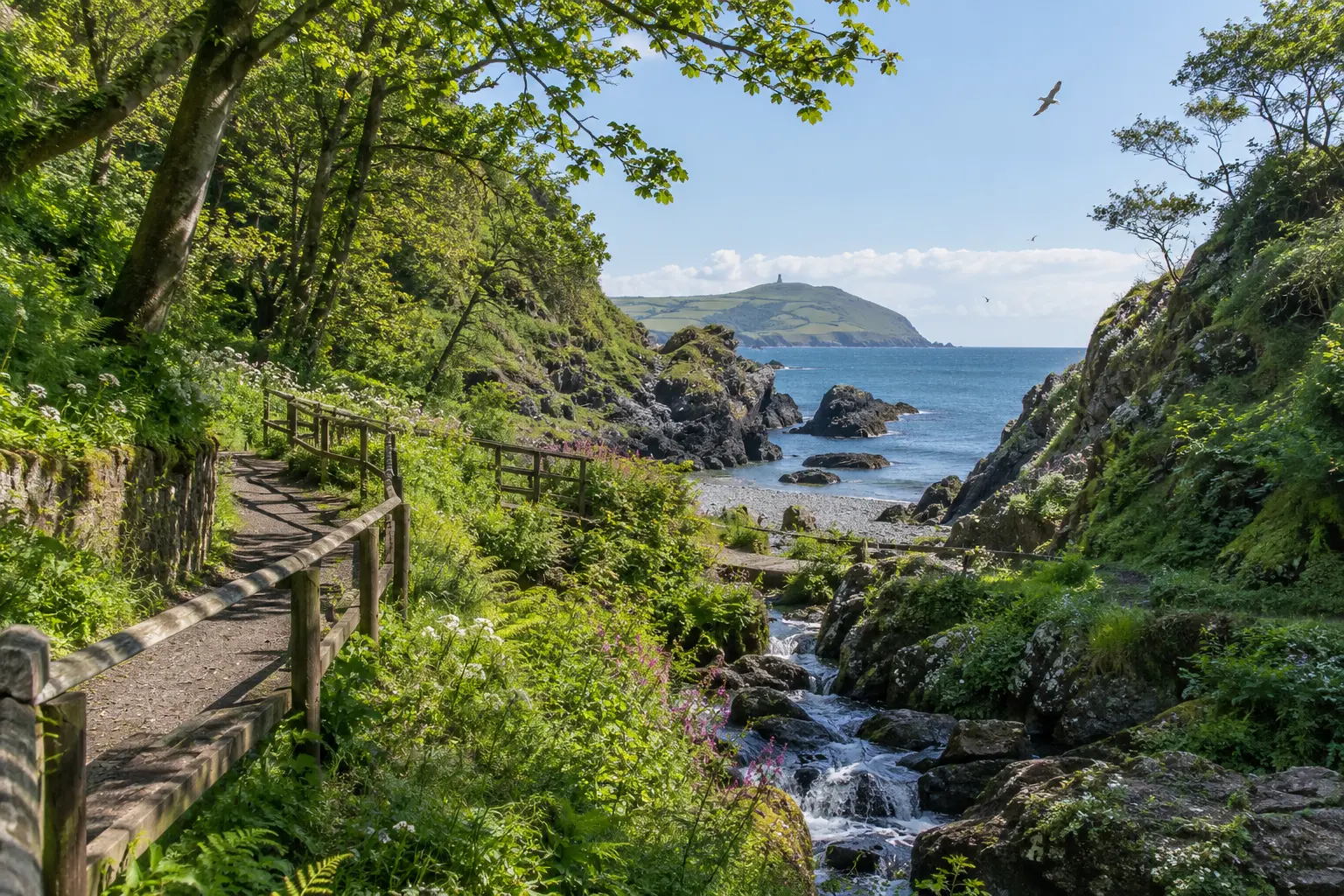 Woodland path leading towards the coast at Groudle Glen
