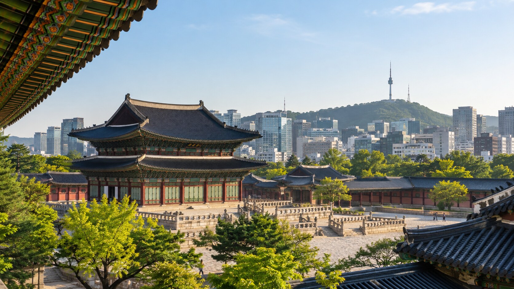 Traditional palace architecture and the Seoul skyline