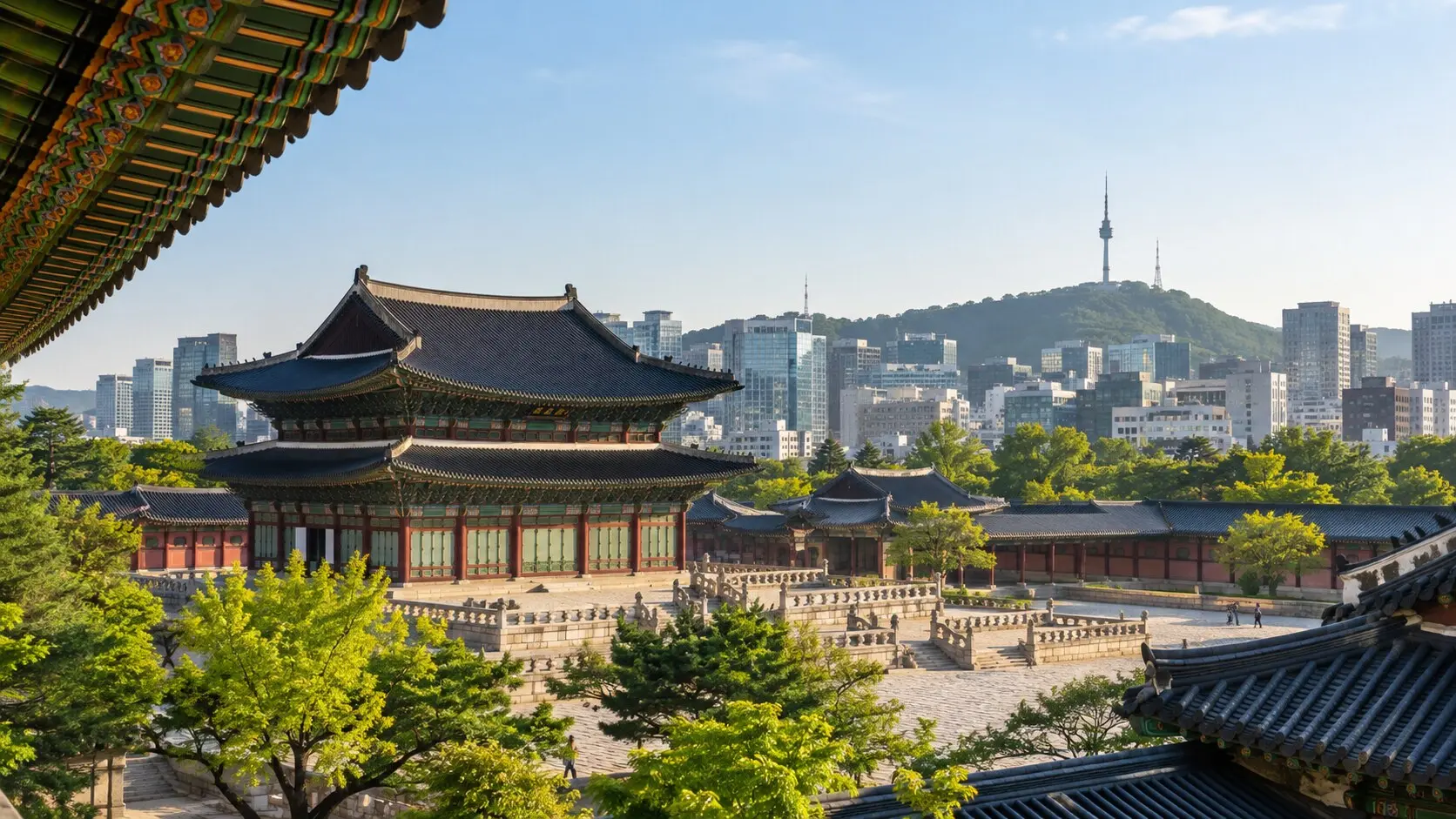 Traditional palace architecture and the Seoul skyline