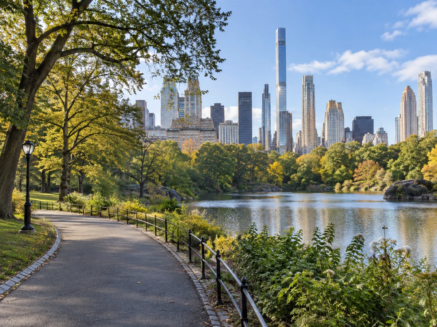 Illustrative Central Park lake and Manhattan skyline