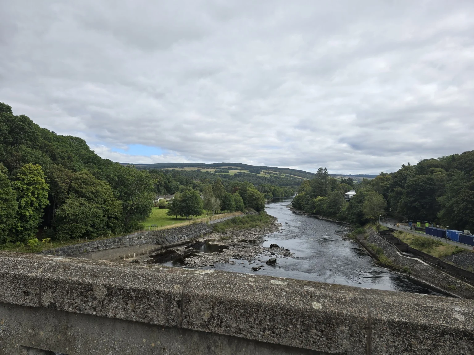 River Tummel flowing through a green valley near Pitlochry